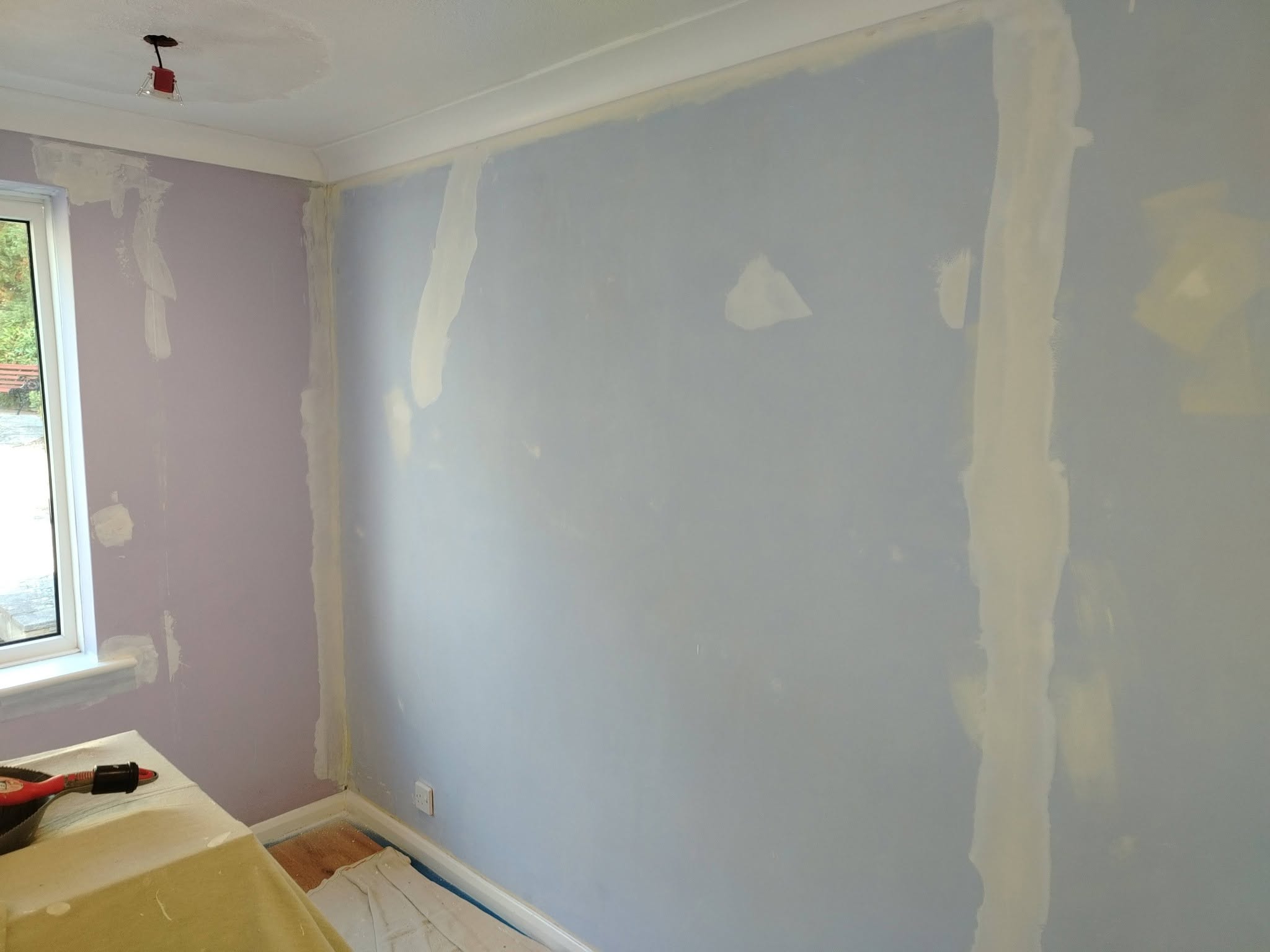 Walls filled and sanded, ready for paint
