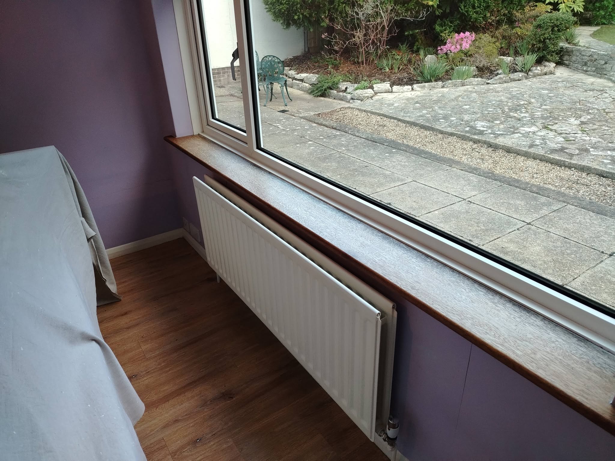 Bedroom window wall before: lilac paint