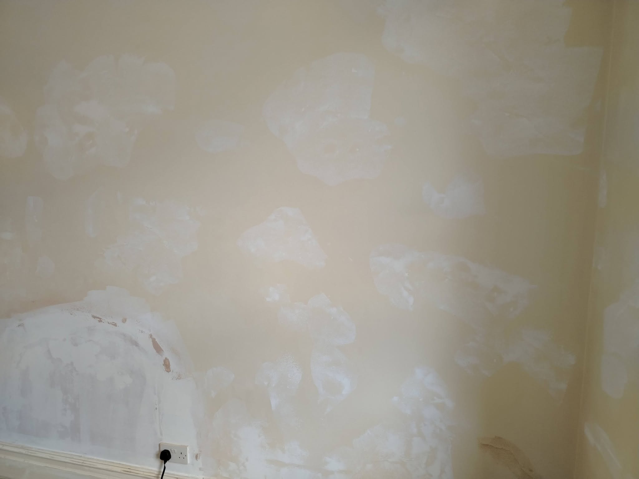 Walls filled and spot-primed during preparation
